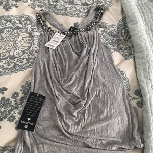 Women’s beaded neck keyhole jersey top